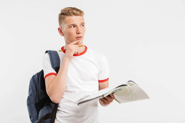 Genç Konsantre Erkek Öğrenci Görüntüsünü Düşünme Bir Kenara Ders Kitapları — Stok fotoğraf
