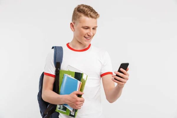 Image European Student Boy Wearing Backpack Smiling Using Smartphone While — Stock Photo, Image