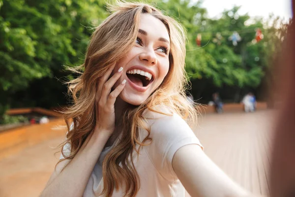 Close Laughing Young Girl Taking Selfie Outstretched Hand Outdoors — Stock Photo, Image