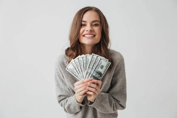 Cheerful Brunette Woman Sweater Holding Money Rejoices While Looking Camera — Stock Photo, Image