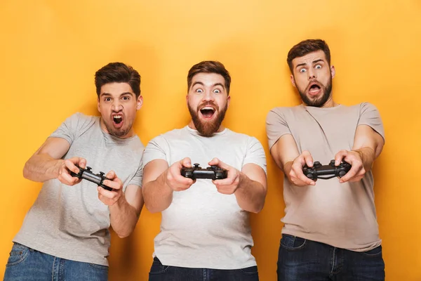 Image Excited Emotional Nervous Young Group Men Friends Standing Isolated — Stock Photo, Image