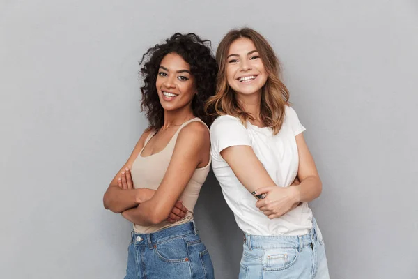 Portrait Two Cheerful Young Women Standing Together Looking Camera Isolated — Stock Photo, Image
