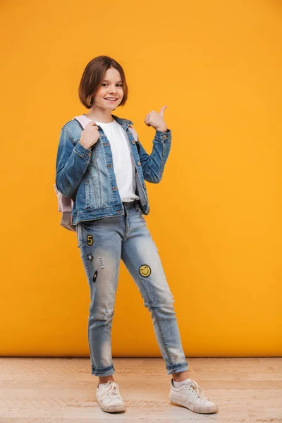 Full Length Portrait Smiling Little Schoolgirl Backpack Looking Camera Pointing — Stock Photo, Image