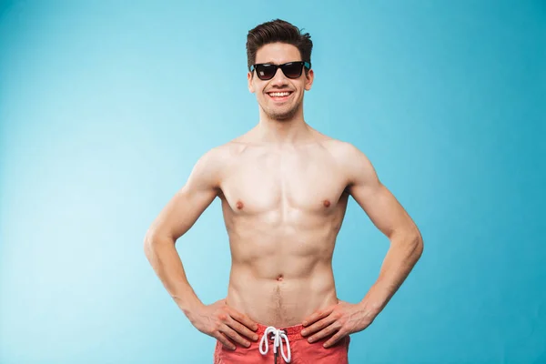 Portrait Smiling Young Shirtless Man Swimming Shorts Sunglasses Standing Hands — Stock Photo, Image