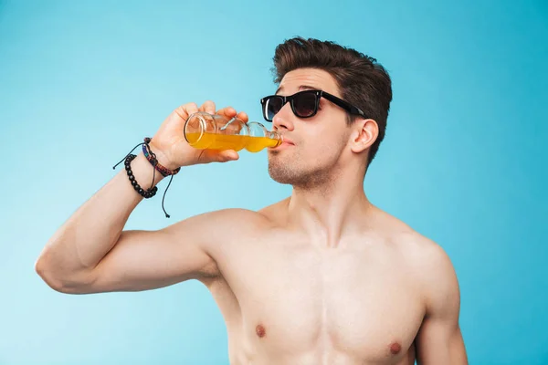 Close Portrait Shirtless Young Man Sunglasses Drinking Beer Bottle Blue — Stock Photo, Image
