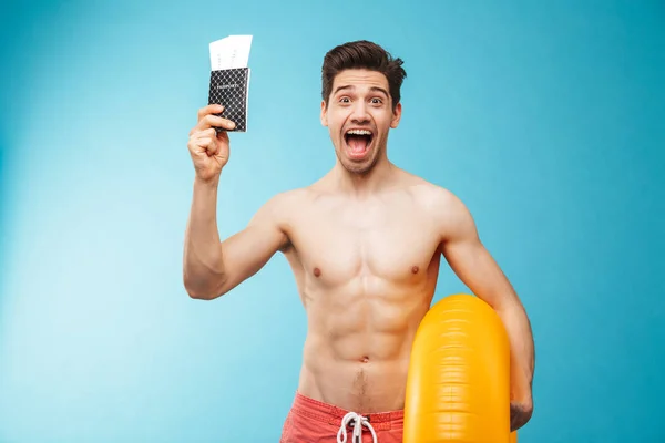 Portrait Cheerful Young Shirtless Man Inflatable Ring Showing Passport Tickets — Stock Photo, Image