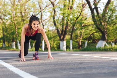 Konsantre genç sporcumuz açık havada çalışmaya hazır