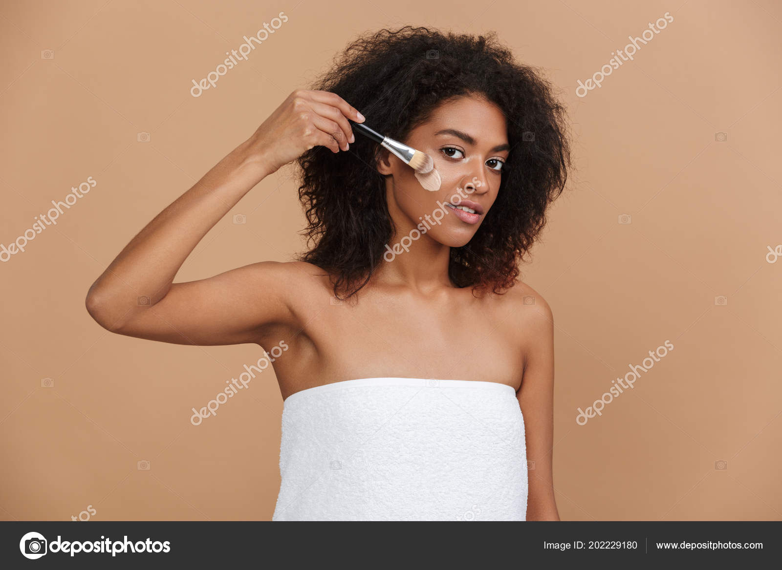 Smiling Pretty Naked Woman Wearing Towel Using Cosmetica Brush Looking
