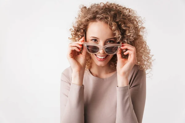 Smiling Blonde Curly Woman Dress Take Sunglasses Looking Camera Grey — Stock Photo, Image