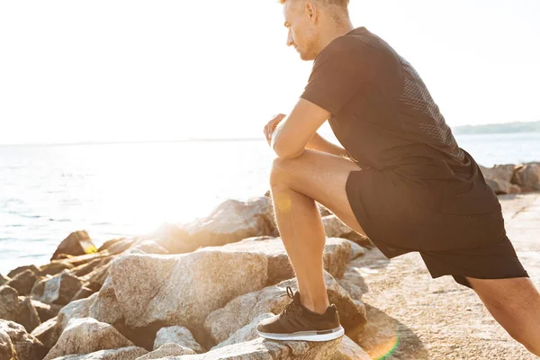Cropped Image Handsome Sportsman Doing Stretching Exercises Seaside Morning — Stock Photo, Image