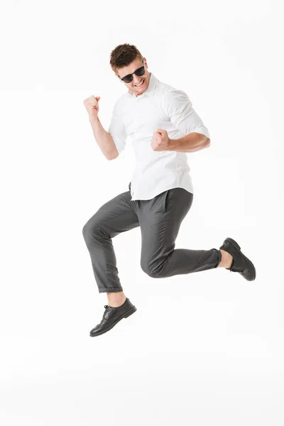 Full Length Portrait Happy Young Man Sunglasses Celebrating Success While — Stock Photo, Image