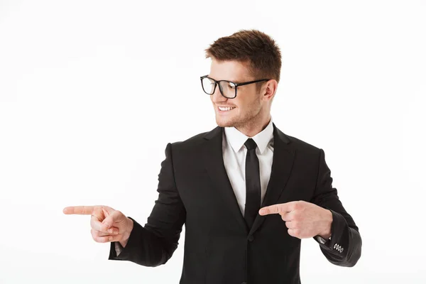 Portrait Happy Young Businessman Suit Eyewear Pointing Fingers Away Copy — Stock Photo, Image