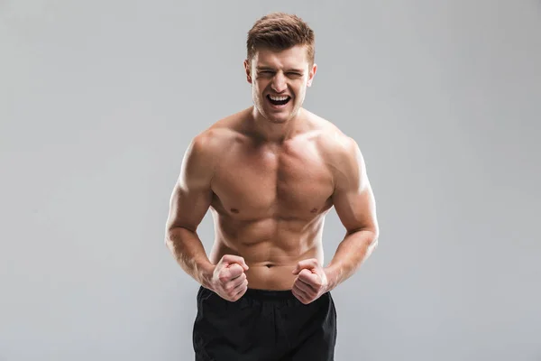 Portrait Strong Shirtless Sportsman Showing His Muscles Isolated Gray Background — Stock Photo, Image