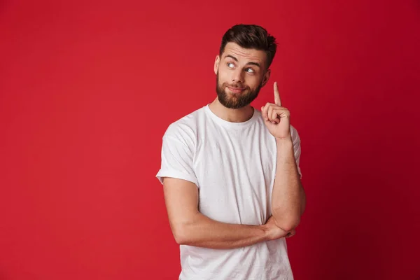 Foto Attraktiv Ung Stilig Man Står Isolerade Över Röda Väggen — Stockfoto