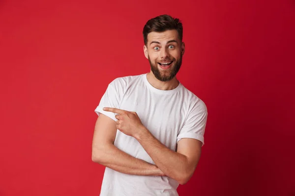 Imagen Joven Guapo Hombre Emocional Parado Aislado Sobre Fondo Pared — Foto de Stock