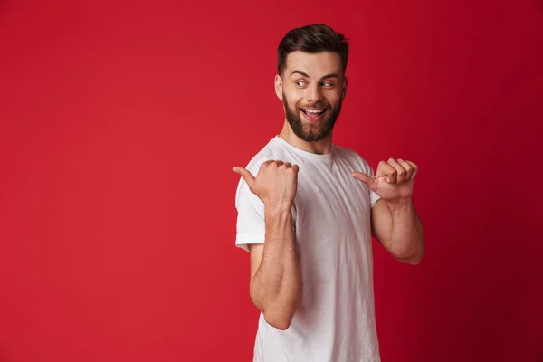 Photo Attractive Young Handsome Man Standing Isolated Red Wall Background — Stock Photo, Image