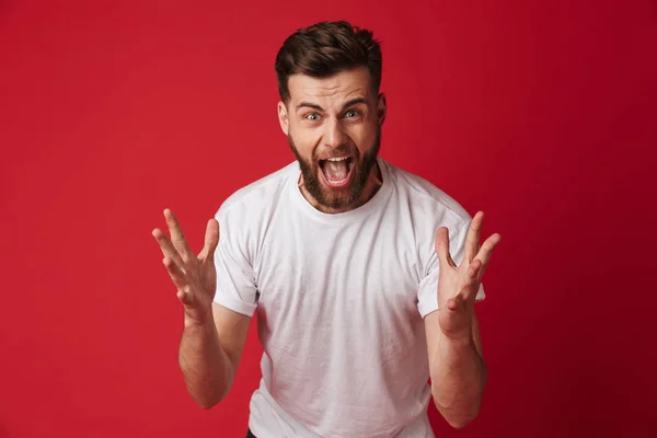 Image Angry Emotional Young Man Standing Isolated Red Wall Background — Stock Photo, Image
