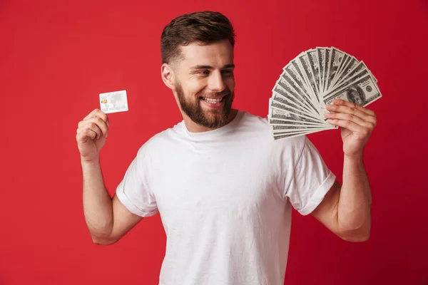 Image Excited Young Man Isolated Red Wall Background Holding Money — Stock Photo, Image