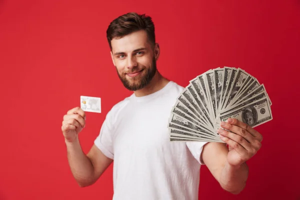 Image Excited Young Man Isolated Red Wall Background Holding Money — Stock Photo, Image