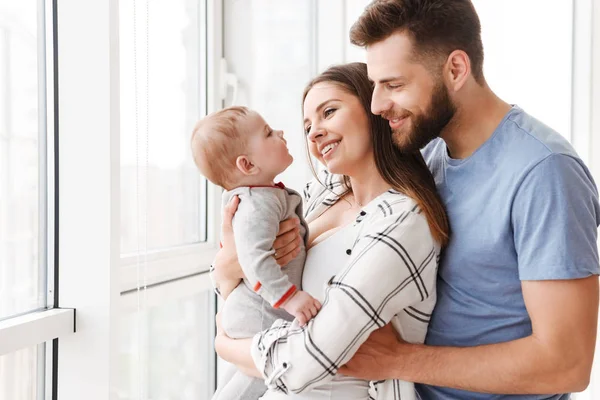 Image Happy Pleased Young Loving Couple Parents Holding Hands Little — Stock Photo, Image