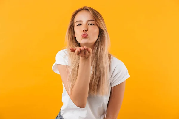 Portrait Lovely Young Blonde Girl Sending Kiss Isolated Yellow Background — Stock Photo, Image