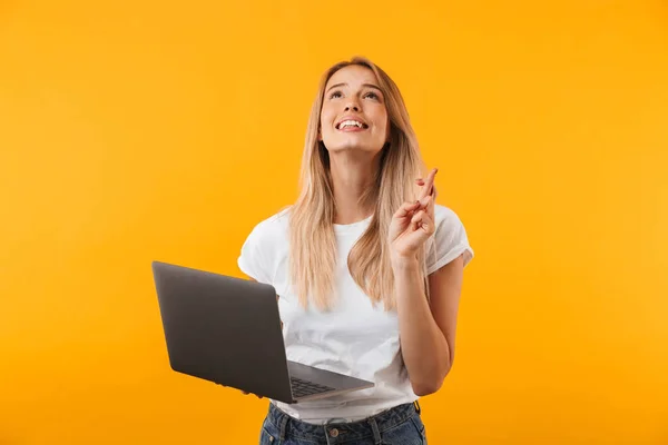 Portrait Smiling Young Blonde Girl Holding Laptop Computer Crossed Fingers — Stock Photo, Image