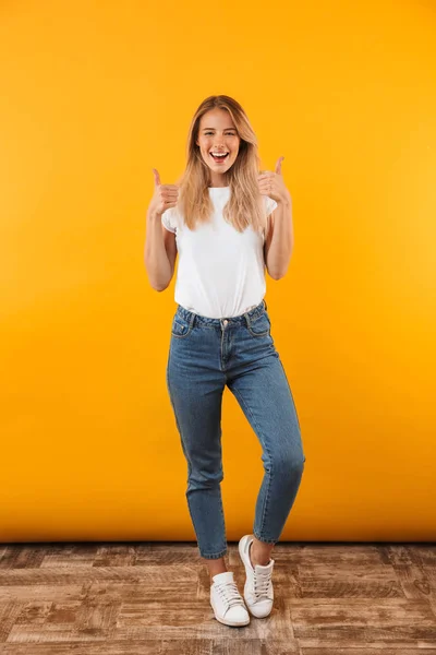 Full Length Portrait Excited Young Blonde Girl Showing Two Thumbs — Stock Photo, Image