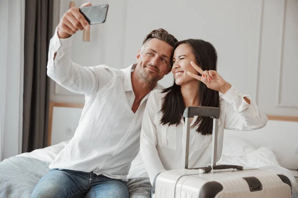 Smiling Young Couple Taking Selfie Mobile Phone While Sitting Together — Stock Photo, Image