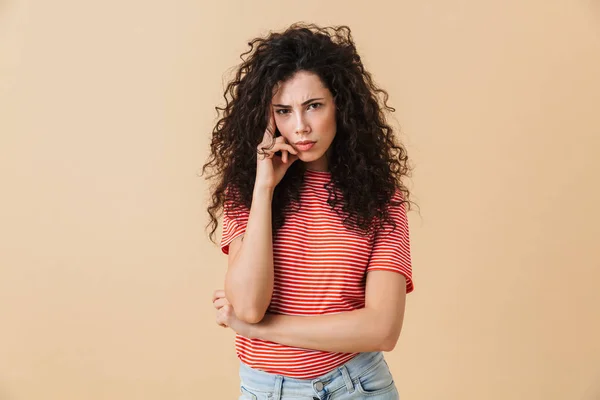 Image Displeased Young Woman Standing Isolated Beige Wall Background Looking — Stock Photo, Image