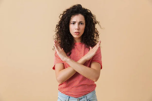 Image Serious Young Woman Standing Isolated Beige Wall Background Showing — Stock Photo, Image