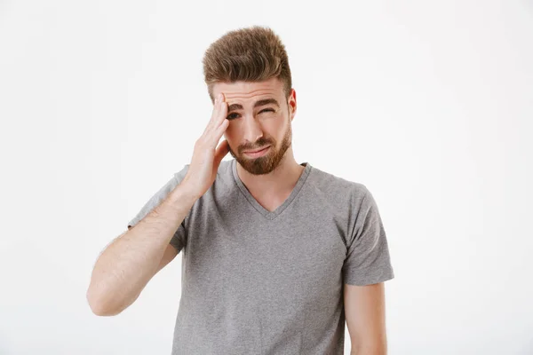 Image Displeased Young Man Headache Standing Isolated White Wall Background — Stock Photo, Image