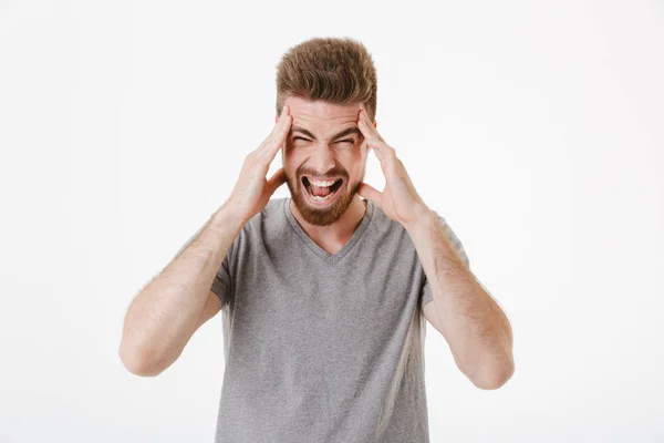 Image Displeased Agressive Screaming Young Man Headache Standing Isolated White — Stock Photo, Image