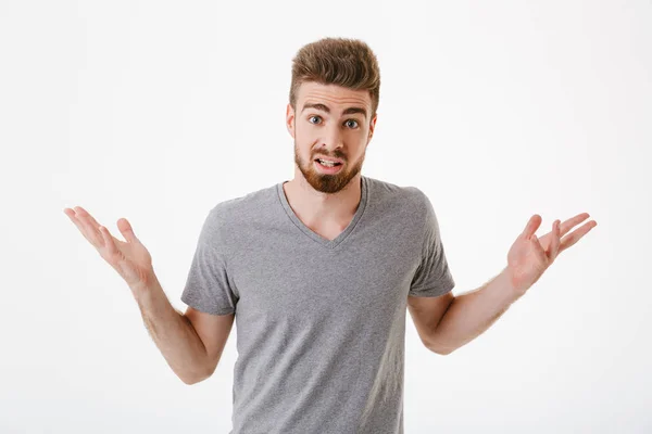 Imagen Joven Confundido Parado Aislado Sobre Fondo Pared Blanco Mirando — Foto de Stock