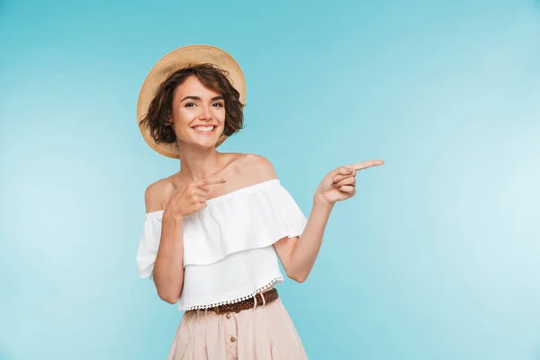 Portrait Smiling Young Woman Summer Hat Pointing Copy Space Isolated — Stock Photo, Image
