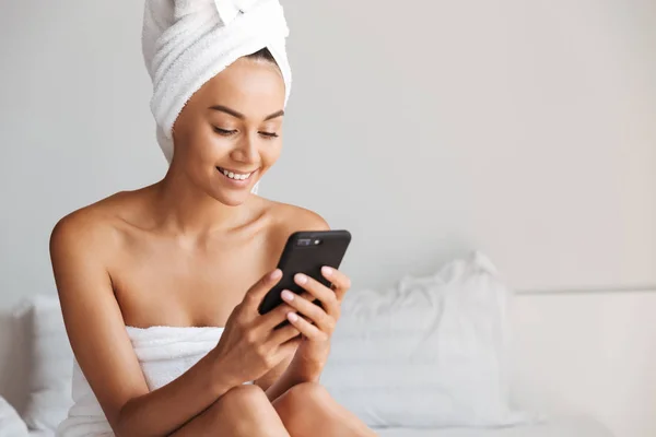 Pretty Young Asian Woman Wrapped Shower Towel Using Mobile Phone — Stockfoto
