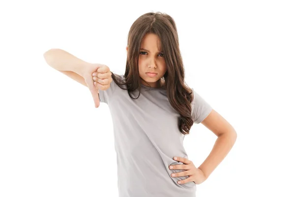 Foto Menina Descontente Isolado Sobre Fundo Parede Branca Com Polegares — Fotografia de Stock