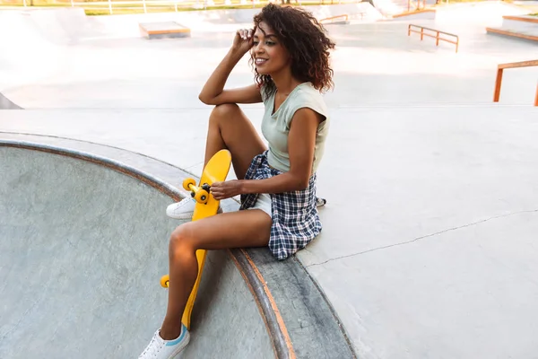 Happy Young Afro American Girl Sitting Skateboard Park — Stock Photo, Image