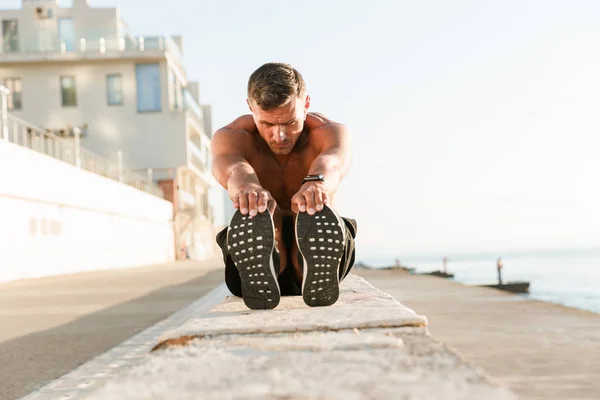 Confident Shirtless Sportsman Doing Stretching Exercises Beach — Stock Photo, Image