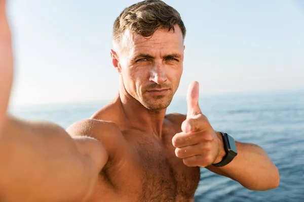 Confident Handsome Shirtless Sportsman Taking Selfie Pointing Finger Camera While — Stock Photo, Image