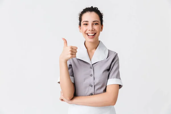Portrait Cheerful Young Housemaid Dressed Uniform Showing Thumbs Gesture Isolated — Stock Photo, Image