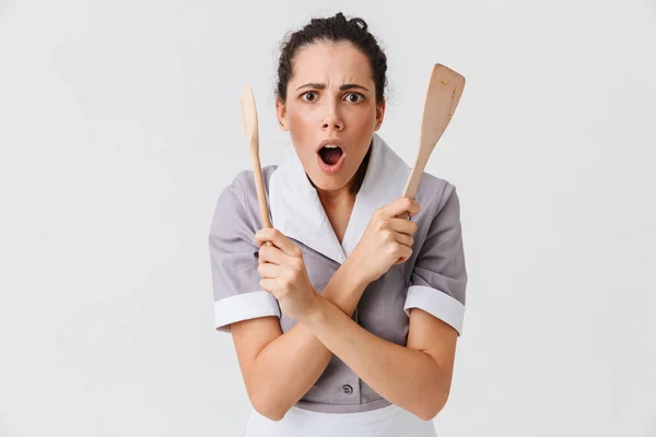 Porträtt Chockad Unga Husa Klädda Uniform Holding Spade Och Sked — Stockfoto