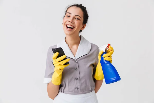 Portrait Cheerful Young Housemaid Dressed Uniform Rubber Gloves Using Mobile — Stock Photo, Image