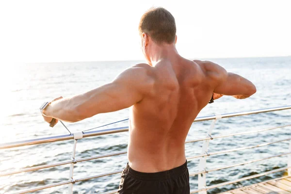 Image Young Strong Sportsman Outdoors Beach Make Exercises Sport Equipment — Stock Photo, Image