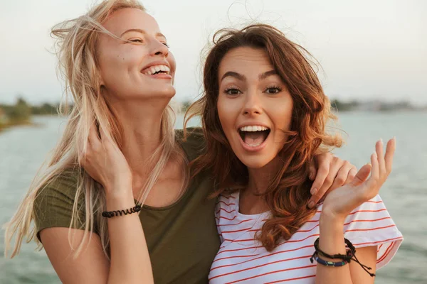 Image Two Happy Women Friends Hugging Outdoors Beach — Stock Photo, Image