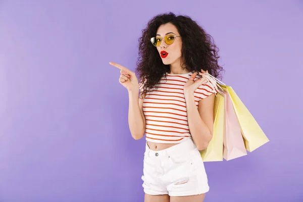 Portrait Pretty Young Casual Woman Carrying Shopping Bags Isolated Pointing — Stock Photo, Image