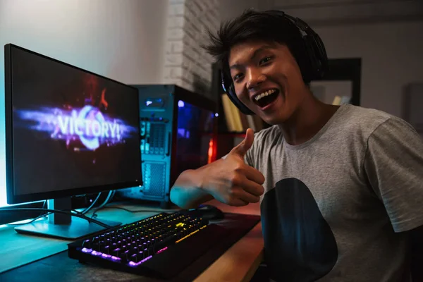 Happy Asian Gamer Guy Rejoicing Victory While Playing Video Games — Stock Photo, Image