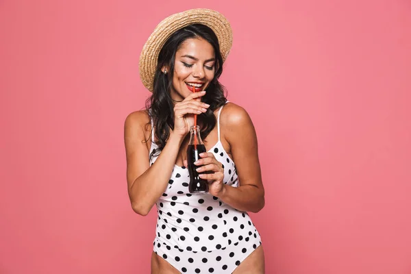 Image Pretty Woman Swimwear Posing Isolated Pink Wall Background Drinking — Stock Photo, Image