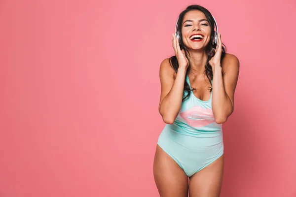 Portrait Cheery Young Woman Swimsuit Isolated Pink Dancing While Listening — Stock Photo, Image