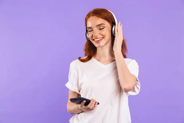 Portrait Smiling Young Girl Standing Isolated Violet Background Holding Mobile — Stock Photo, Image