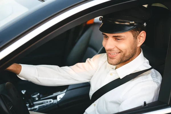 Portrait Young Joyful Man Taxi Driver Uniform Cap Driving Car — Stock Photo, Image